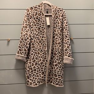Amazingly soft and cozy leopard print sweater size large.